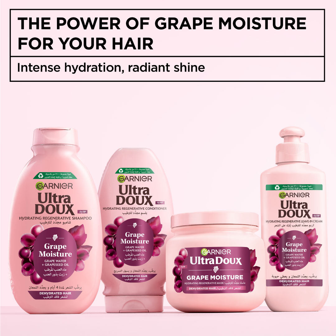 Garnier Ultra Doux hair care products with grape moisture on a white background